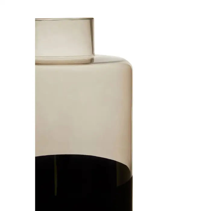 Close Up- The COVA large vase with narrow bottle neck, has a smoked top that creates a shaded effect. Set against a black base.