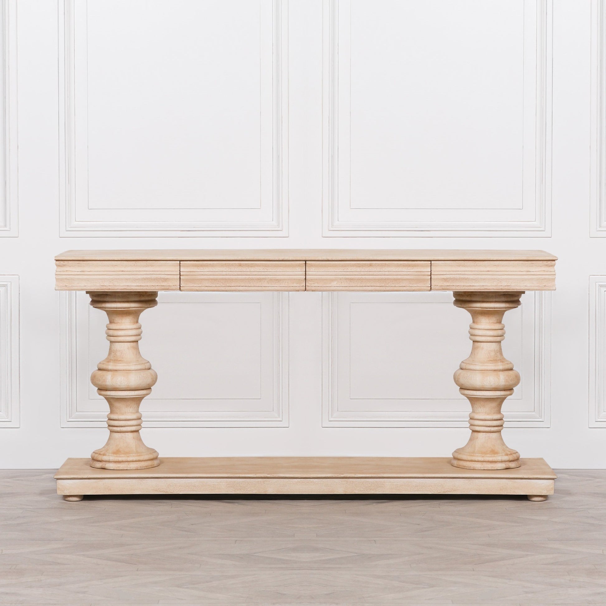 MANGO WOOD CONSOLE TABLE, crafted from mango wood and decorated with hand-carved intricately detailed column legs with two drawers