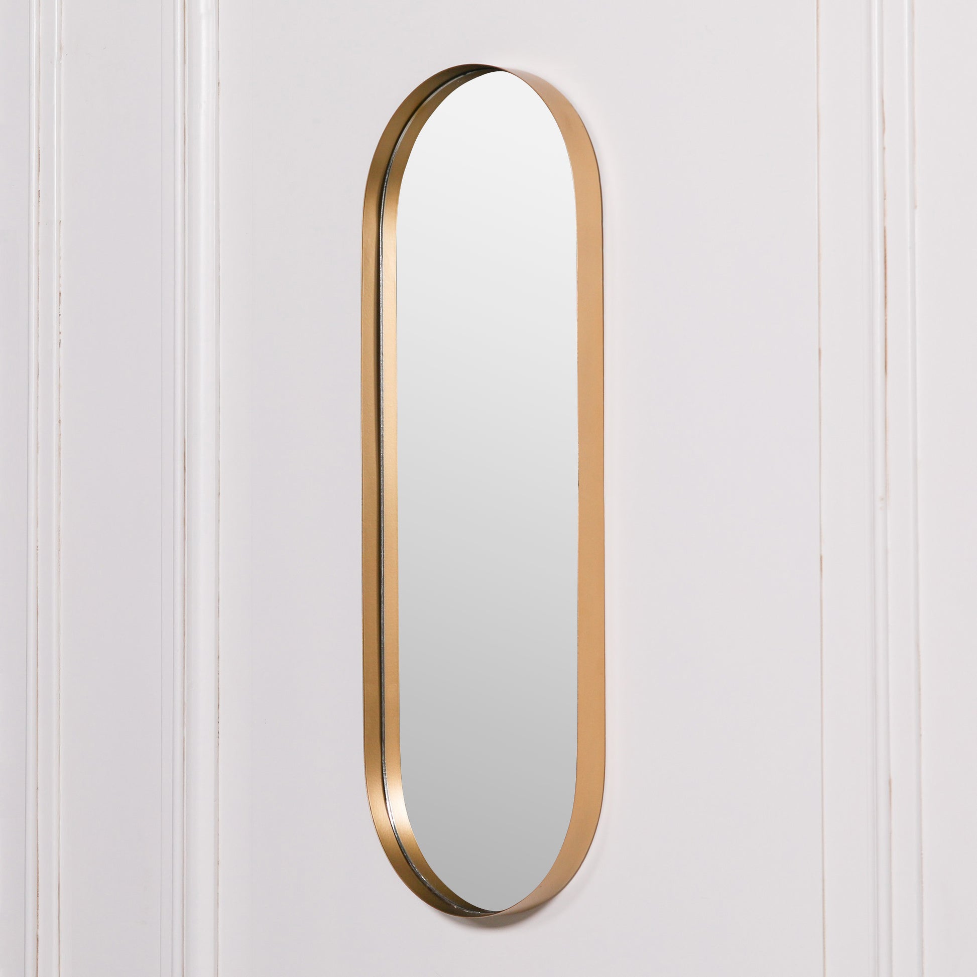 Gold finish slim oval wall mirror