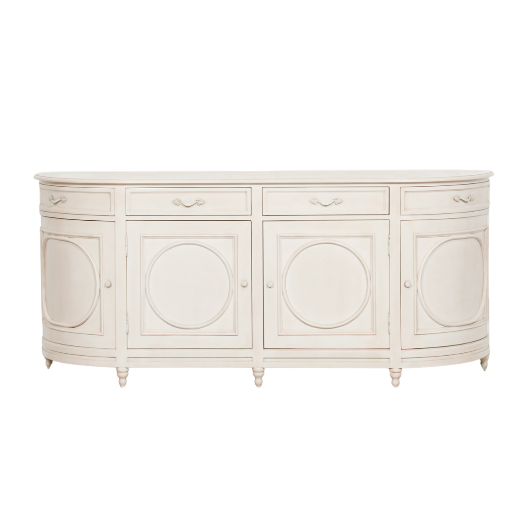 SIDEBOARD aged ivory finish paired with ornate detailing across the door panels and handles