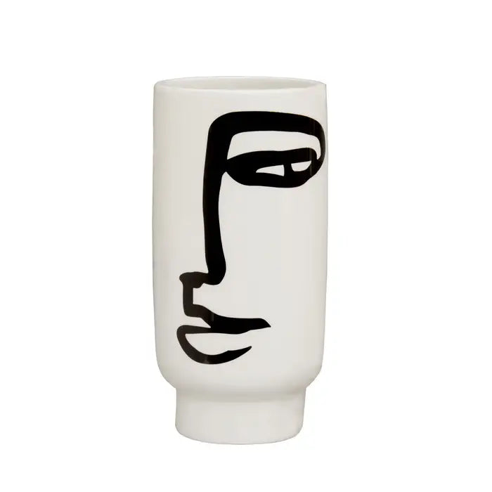 Fabia black and white small face vase - rom robust ceramic, and finished in a white hue, this small vase features an abstract face drawing.