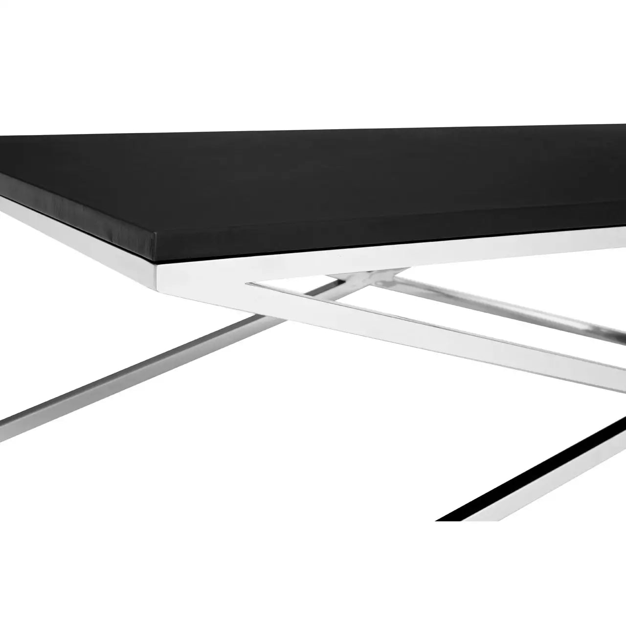 Close up view of The Tribute Coffee table with black table top and stainless steel criss-crosed legs