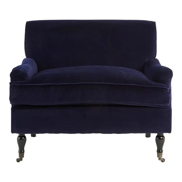 Midnight blue plush velvet armchair with birchwood carved legs