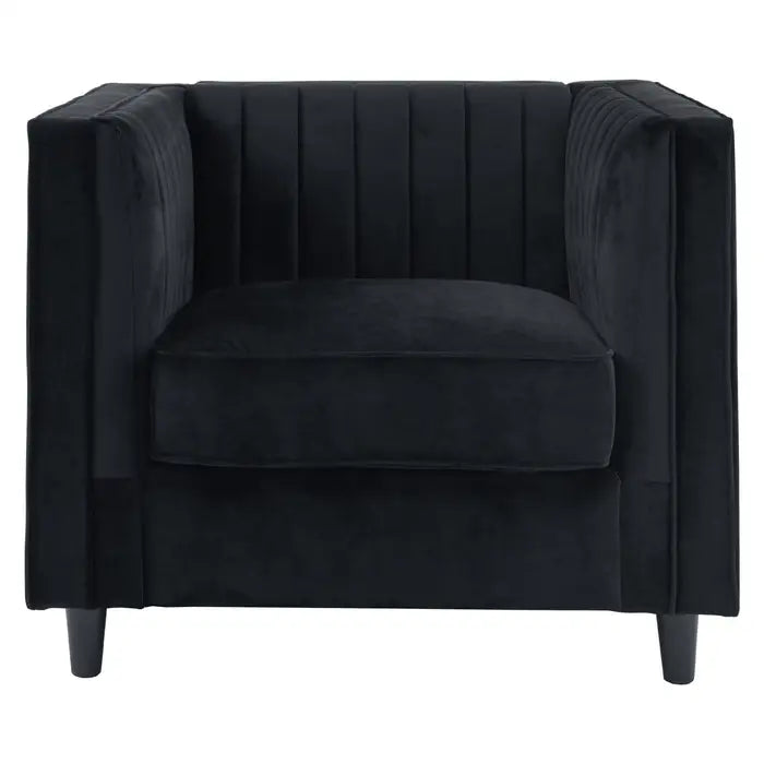 The Farah chair- black velvet armchair with boxy square shape, pleated armrests and wooden feet