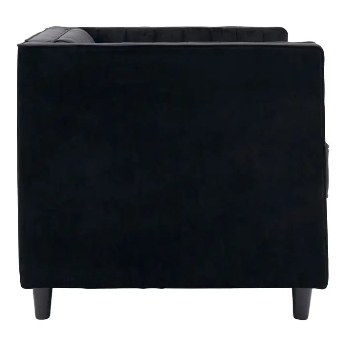 The Farah chair- Side view black velvet armchair with boxy square shape, pleated armrests and wooden feet