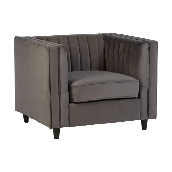 The Farah chair- grey velvet armchair with boxy square shape, pleated armrests and wooden feet