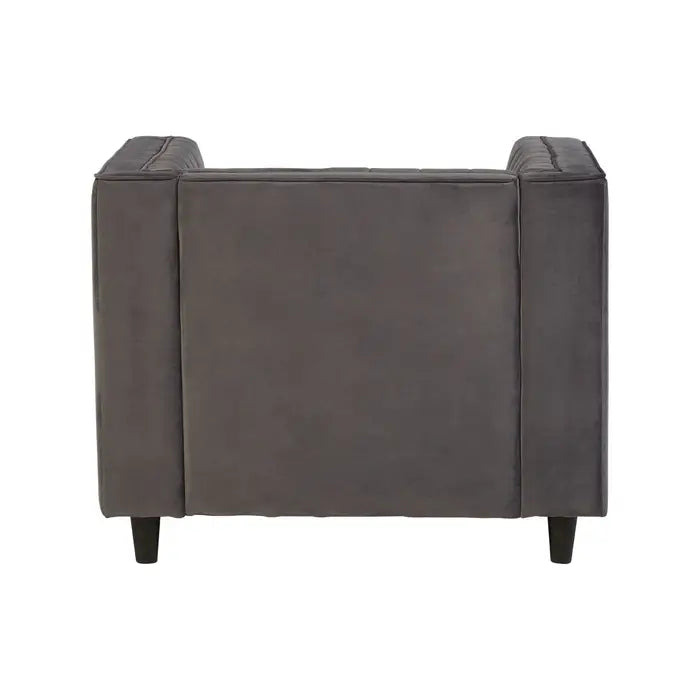 The Farah chair- Side view grey velvet armchair with boxy square shape, pleated armrests and wooden feet