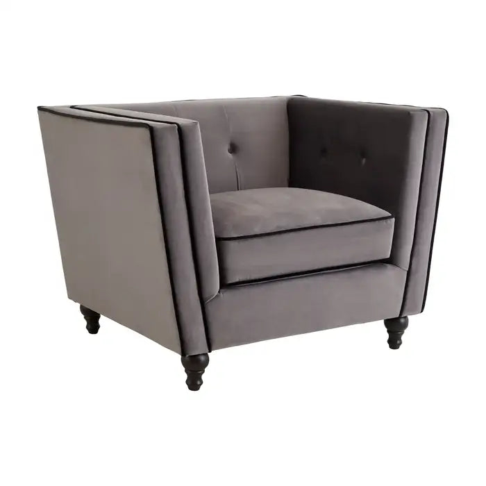 Ferris Grey Chair- Tapered design chair upholstered in grey velvet fabric with black piped trim, with shallow button tufting and Matt black finished wooden carved feet