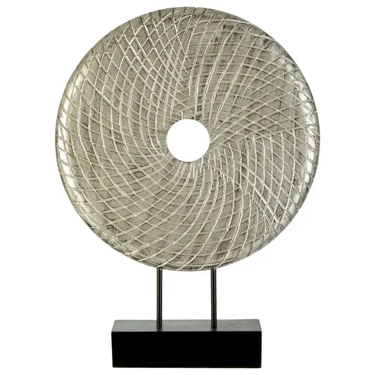 Mango wood round wooden sculpture is carved to form a flared grid pattern