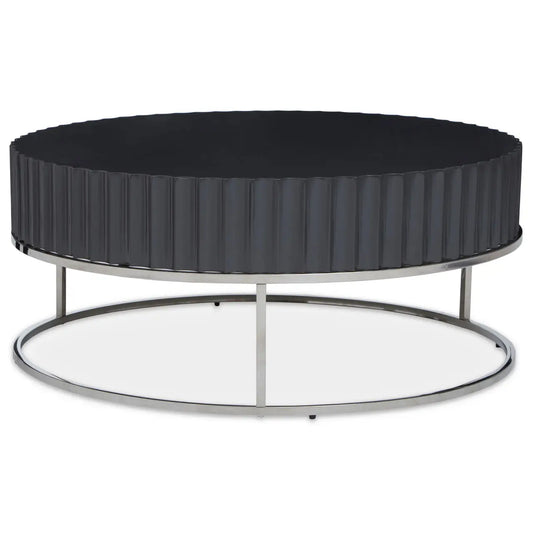 Grey finish round coffee table with fluted carvings and polished stainless steel frame legs